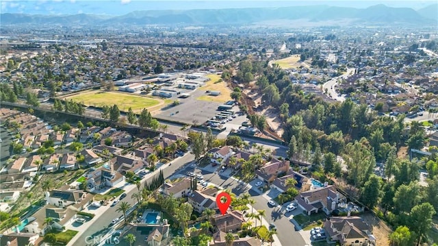 drone / aerial view featuring a mountain view