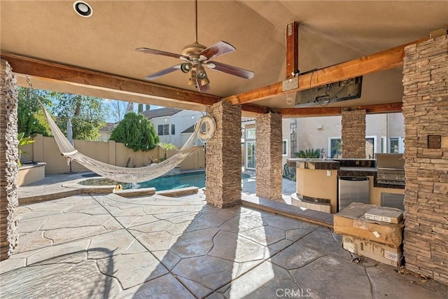 view of patio / terrace with ceiling fan, area for grilling, and grilling area