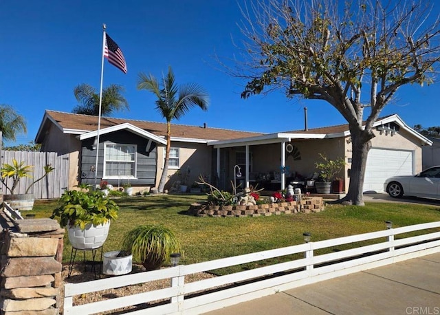 ranch-style house with a garage and a front yard