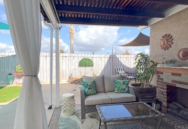 view of patio / terrace with fence and outdoor lounge area