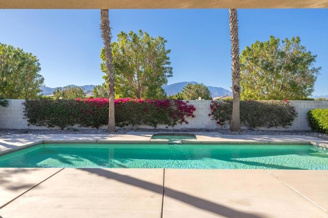 view of pool featuring a mountain view