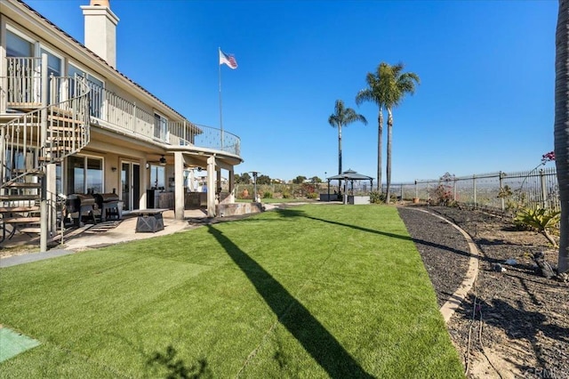 view of yard with a gazebo and a patio area