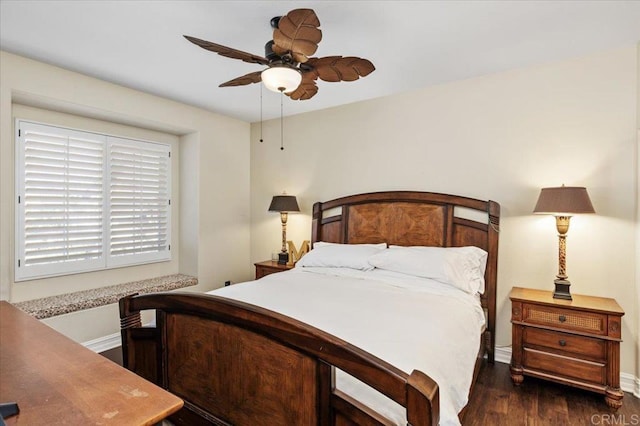 bedroom featuring dark hardwood / wood-style floors and ceiling fan