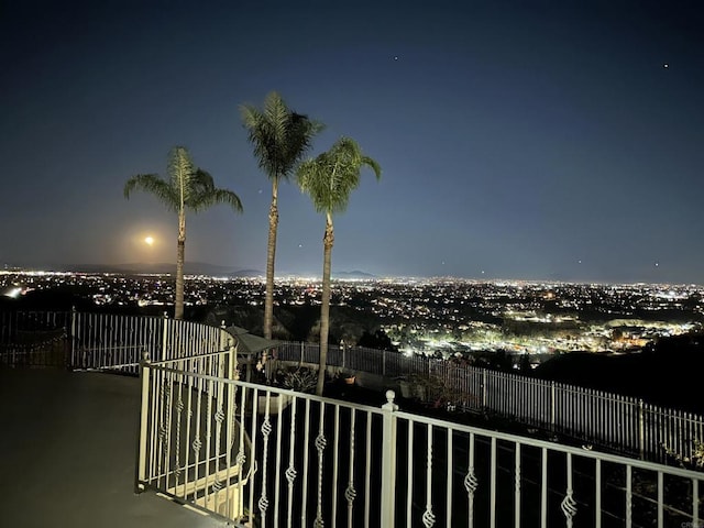 view of balcony at twilight