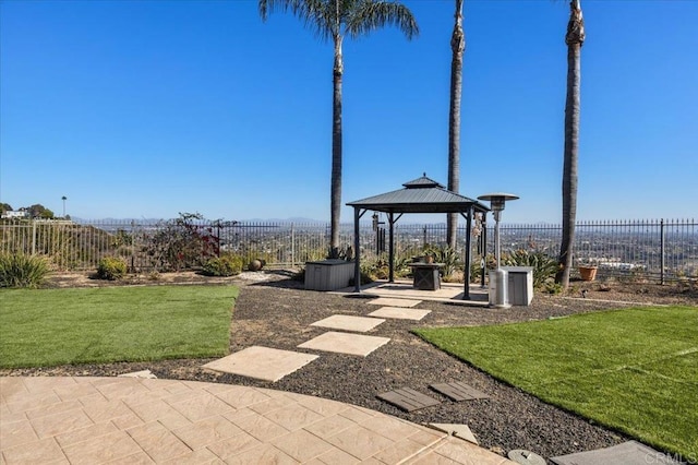 exterior space with a gazebo, a yard, and a patio area