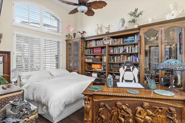 bedroom featuring a towering ceiling