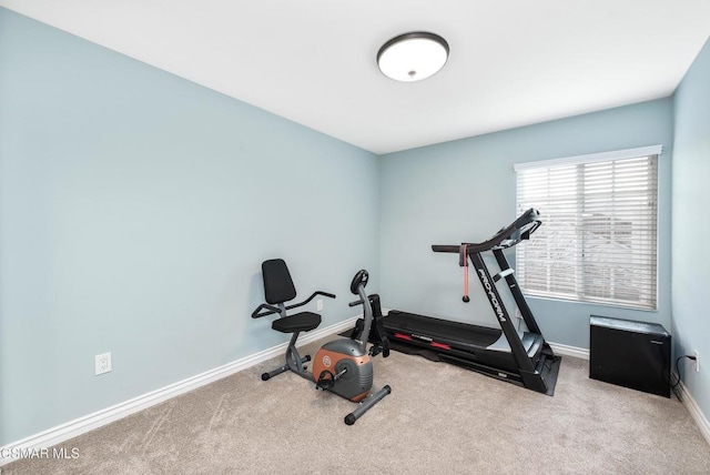 workout room with light colored carpet