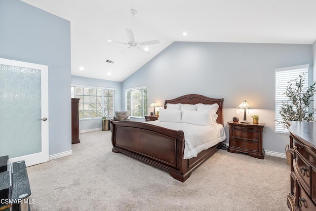 bedroom with lofted ceiling, light carpet, and ceiling fan