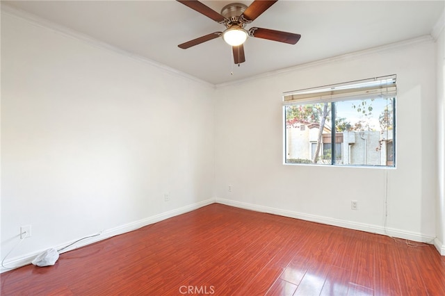 unfurnished room with wood-type flooring, ornamental molding, and ceiling fan