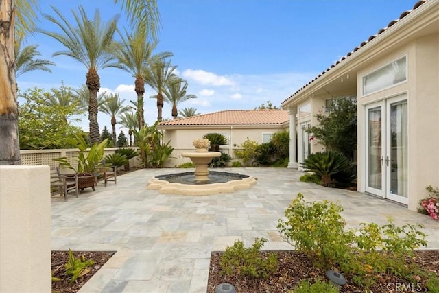 view of patio / terrace featuring french doors