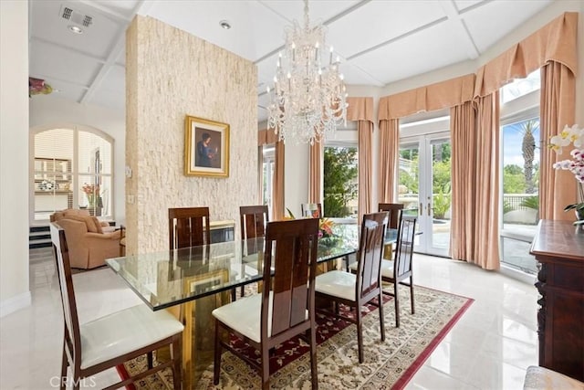 dining area featuring coffered ceiling, a notable chandelier, light tile patterned floors, and french doors