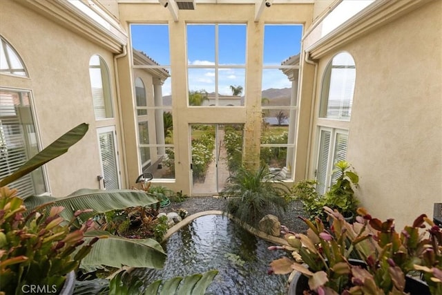 sunroom featuring a healthy amount of sunlight