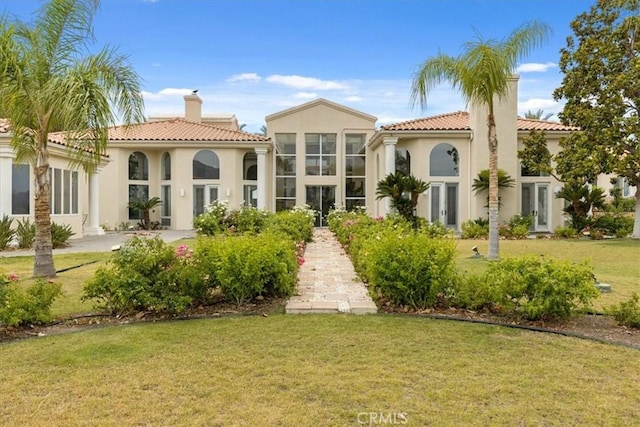 view of front facade with a front yard