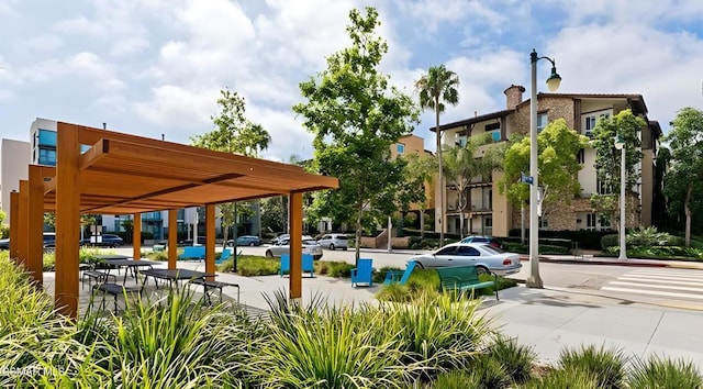 view of community featuring a pergola