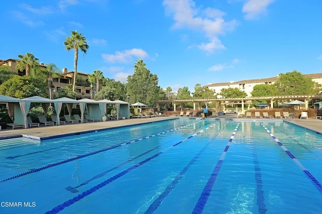 view of pool with a patio and a gazebo