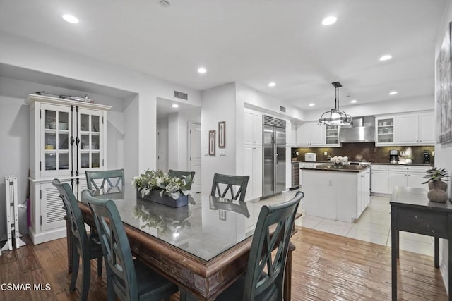 dining space with light tile patterned floors