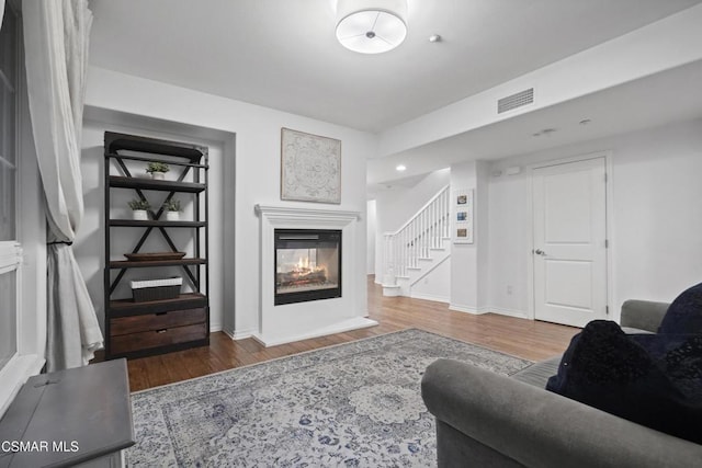 living room with hardwood / wood-style floors