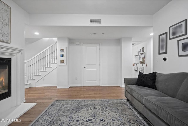 living room with hardwood / wood-style flooring