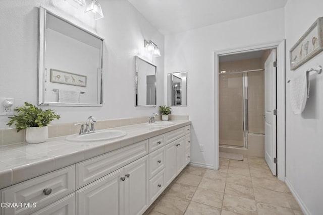 bathroom with vanity and walk in shower