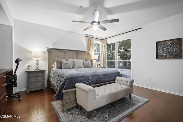 bedroom featuring dark hardwood / wood-style floors, access to exterior, and ceiling fan