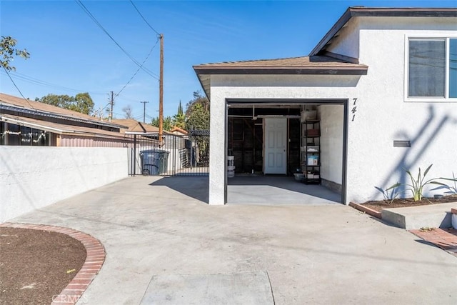 view of patio featuring a garage