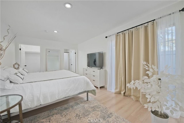 bedroom featuring light hardwood / wood-style floors