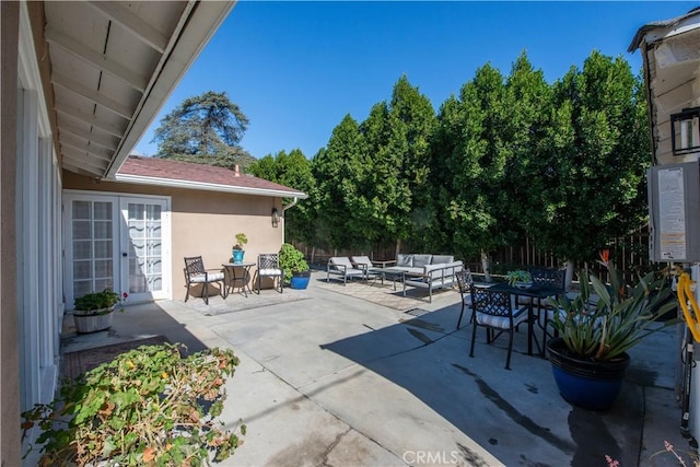 view of patio / terrace featuring french doors and outdoor lounge area