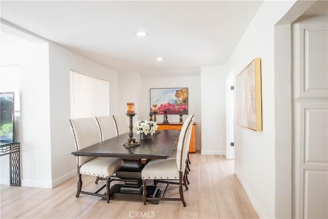 dining room featuring light hardwood / wood-style flooring