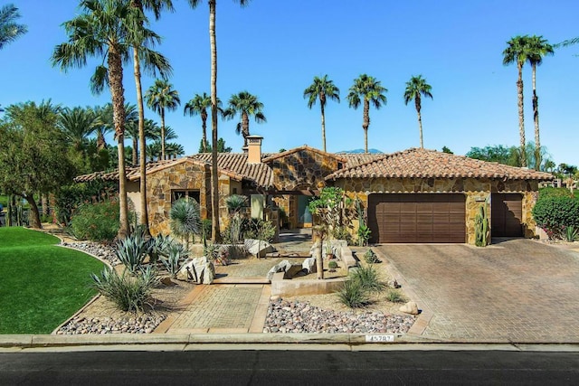 view of front of property with a garage