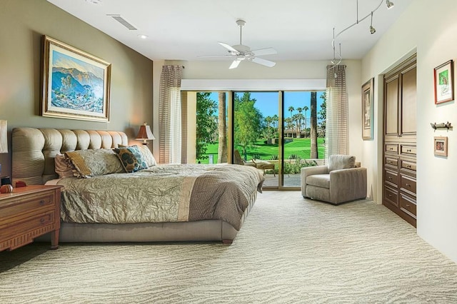 bedroom featuring access to outside and ceiling fan