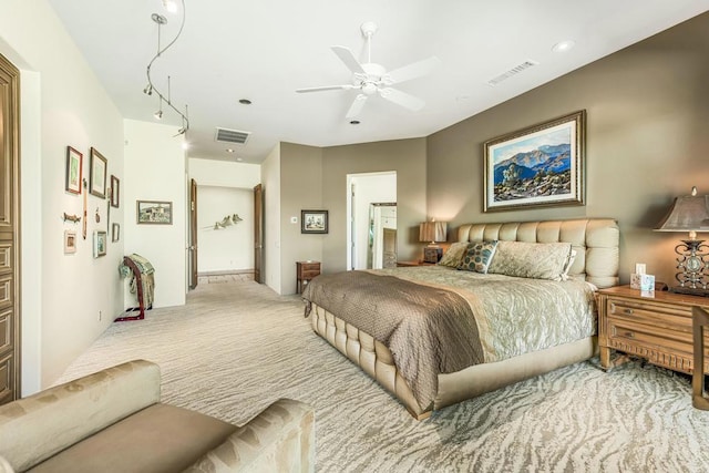 carpeted bedroom with ceiling fan