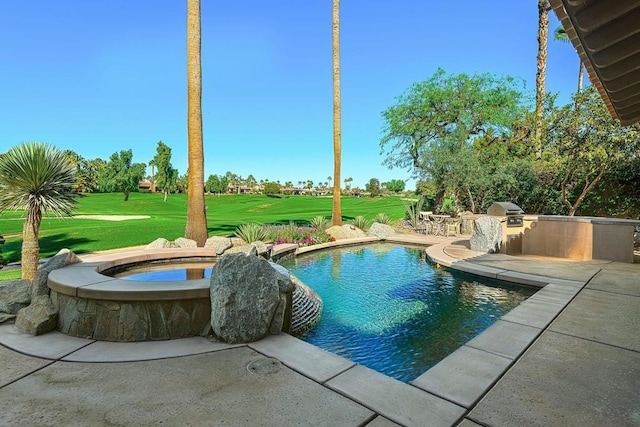 view of swimming pool featuring an in ground hot tub, area for grilling, a patio area, and a lawn