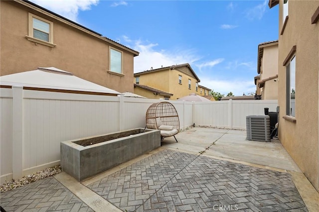 view of patio with cooling unit