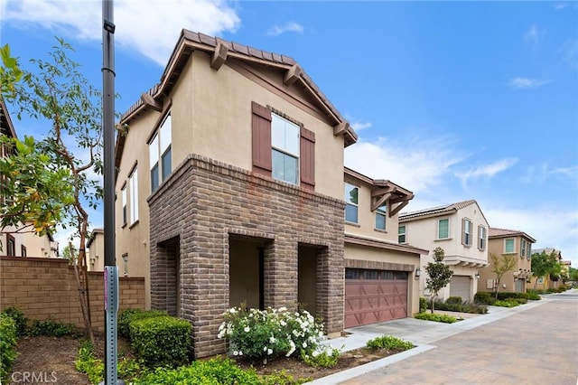 view of front of home with a garage