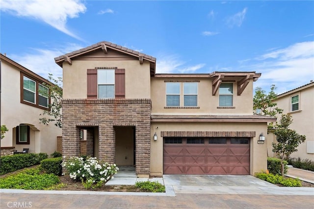 view of front of property with a garage