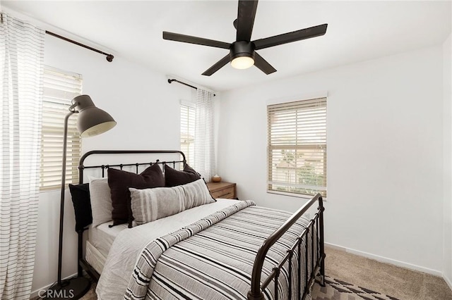 bedroom featuring ceiling fan and carpet flooring