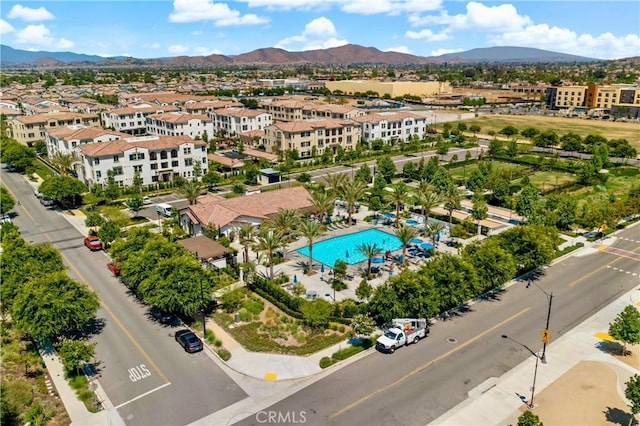 birds eye view of property featuring a mountain view