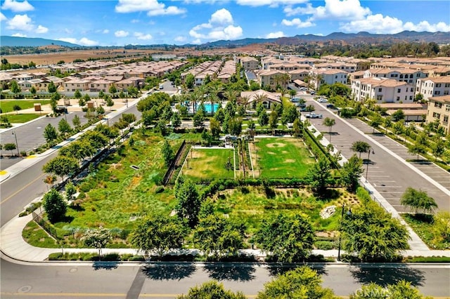 birds eye view of property featuring a mountain view