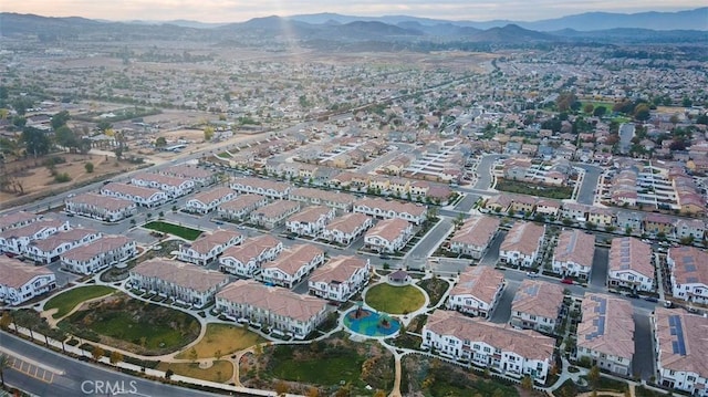 birds eye view of property featuring a mountain view