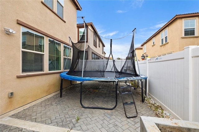 view of patio / terrace with a trampoline