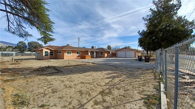 ranch-style house featuring a garage