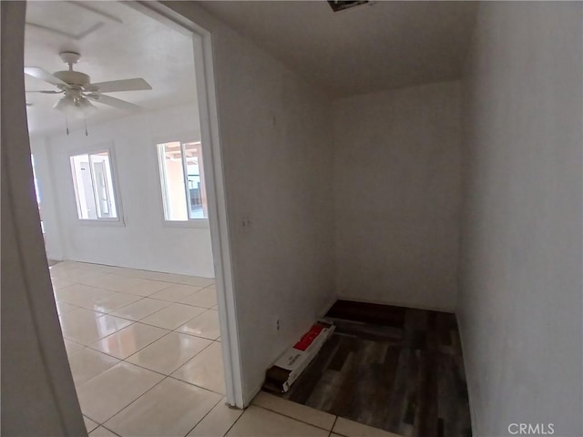 hall with light tile patterned flooring