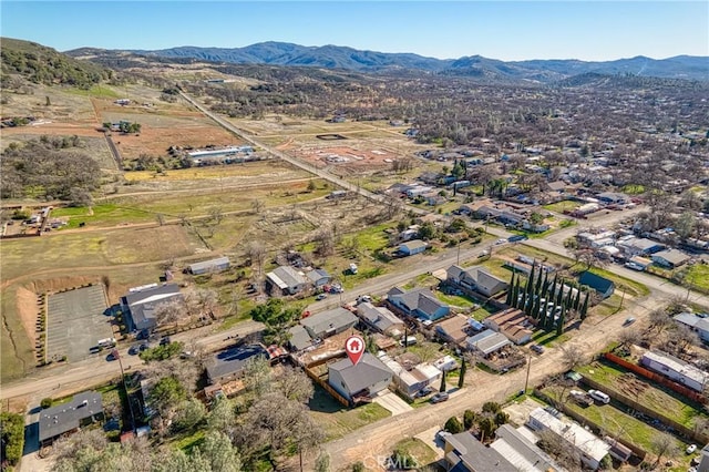 bird's eye view with a mountain view