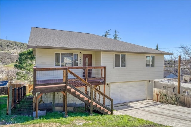 view of front of house with a garage and covered porch