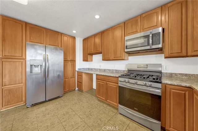 kitchen featuring appliances with stainless steel finishes