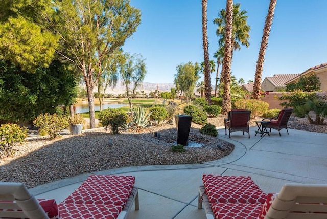 view of patio / terrace with a water view