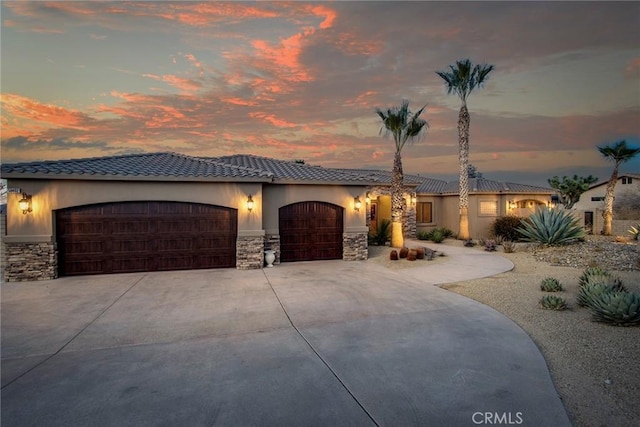 view of front of property featuring a garage