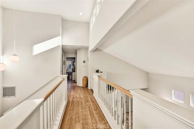 hall with light wood-type flooring