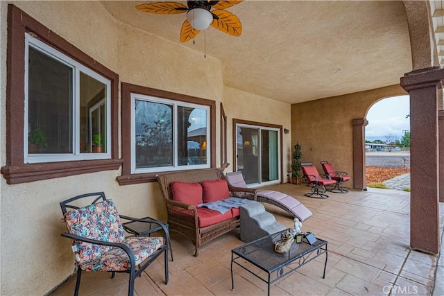 view of patio / terrace featuring ceiling fan and outdoor lounge area