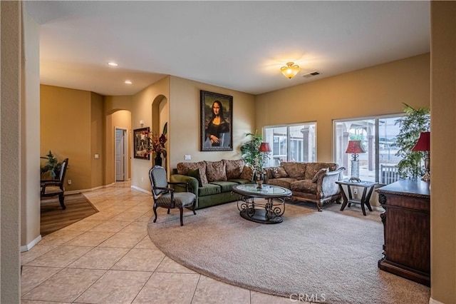 living room with light tile patterned floors